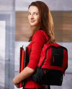 Girl with red shirt and red backpack