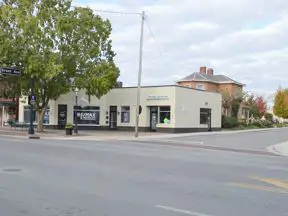 HR Personal Expresions building side view from across street