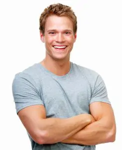 Man in gray t-shirt with arms crossed across chest